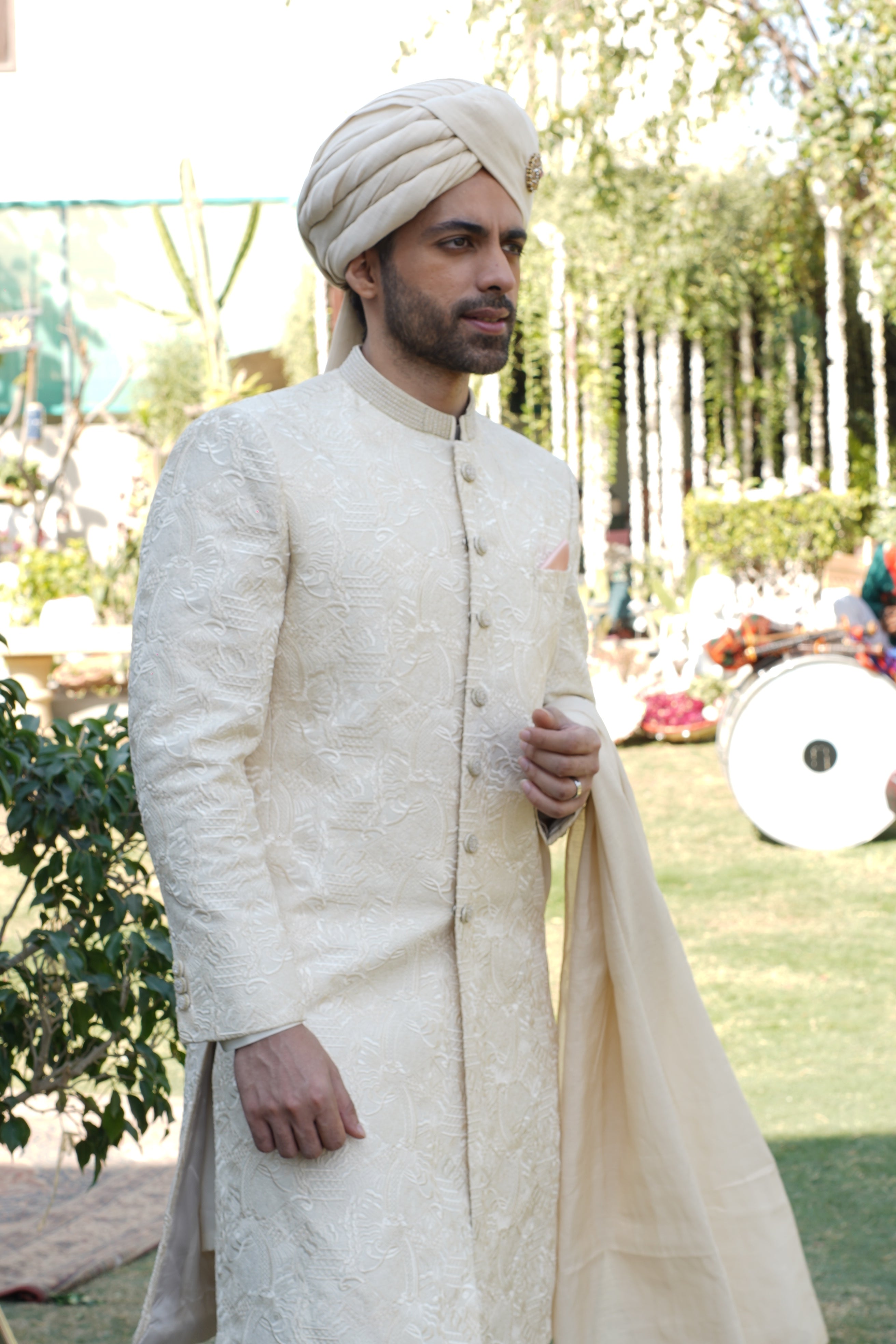IVORY SHERWANI COLLAR AND BUTTON  EMBLESHMENT