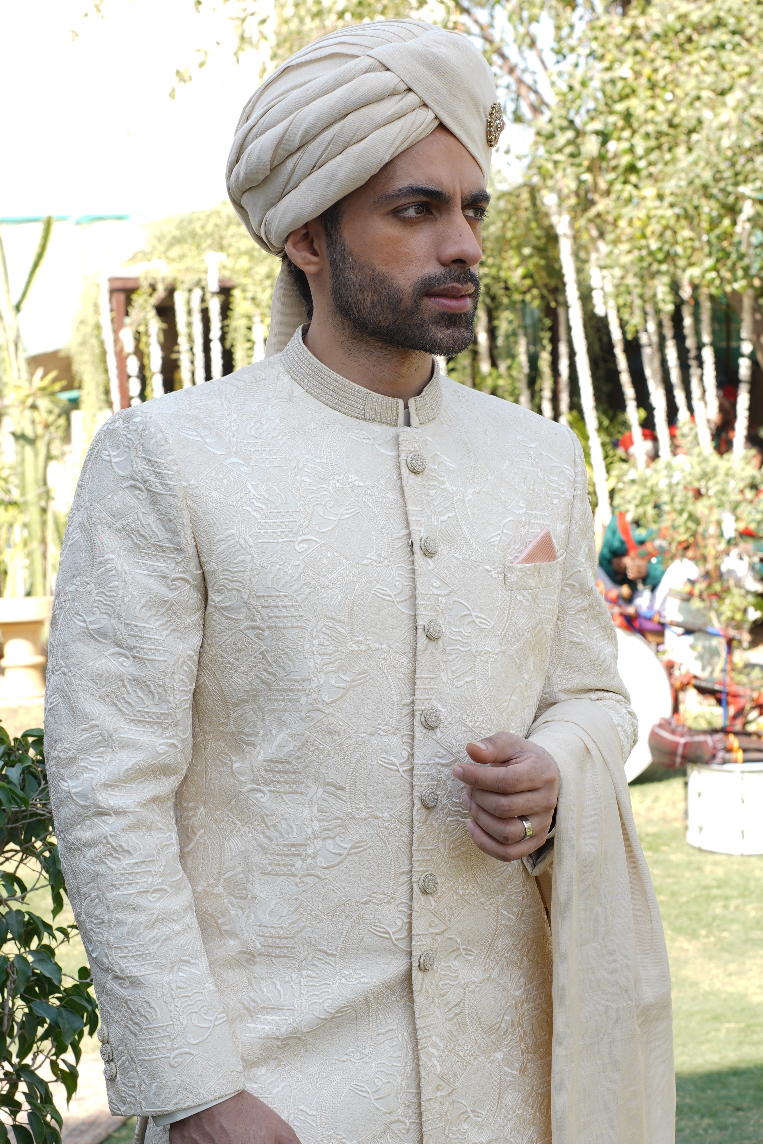 IVORY SHERWANI COLLAR AND BUTTON  EMBLESHMENT