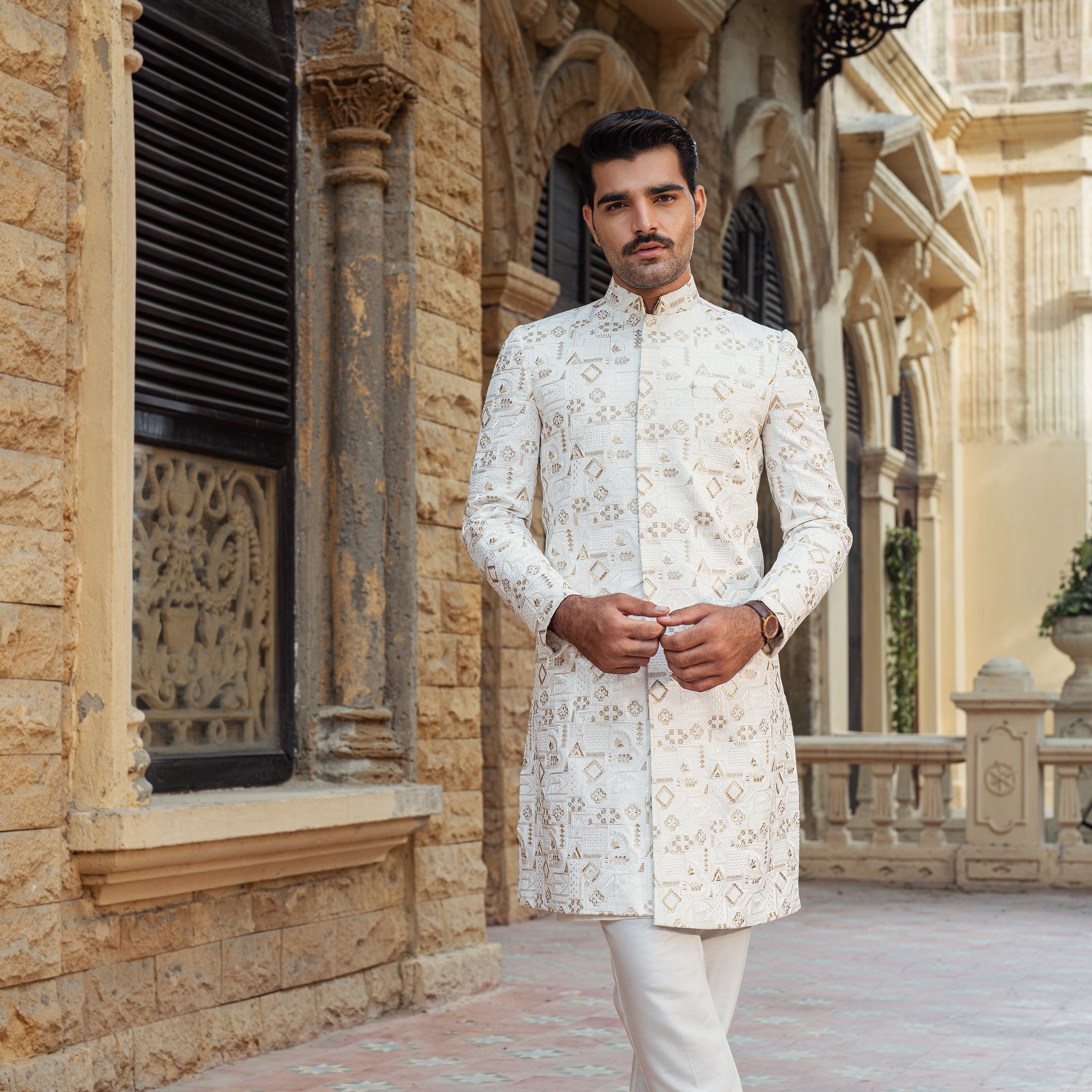 Off white mixture of soft gold Sherwani