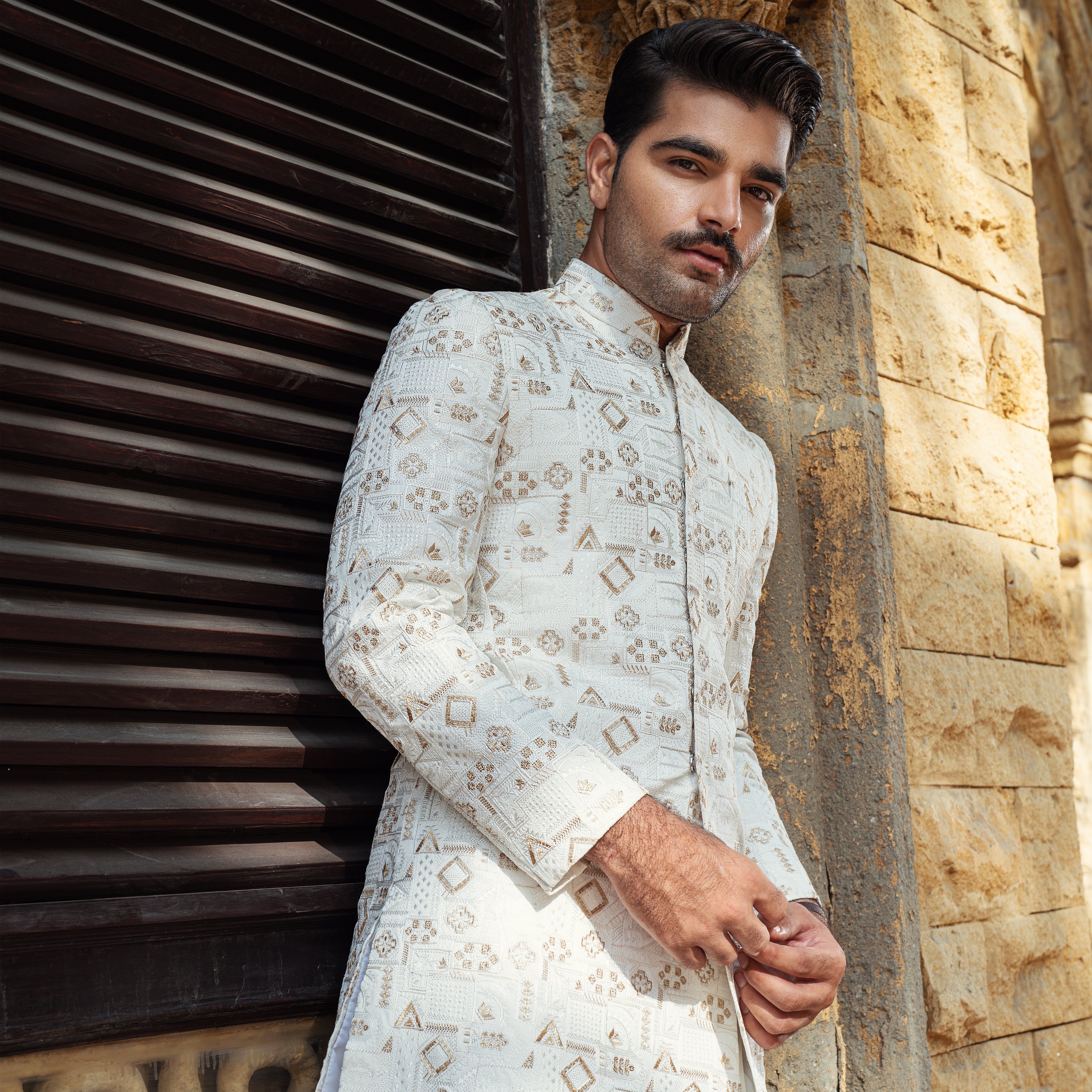 Off white mixture of soft gold Sherwani