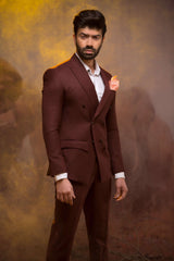 Dark maroon double breasted suit.