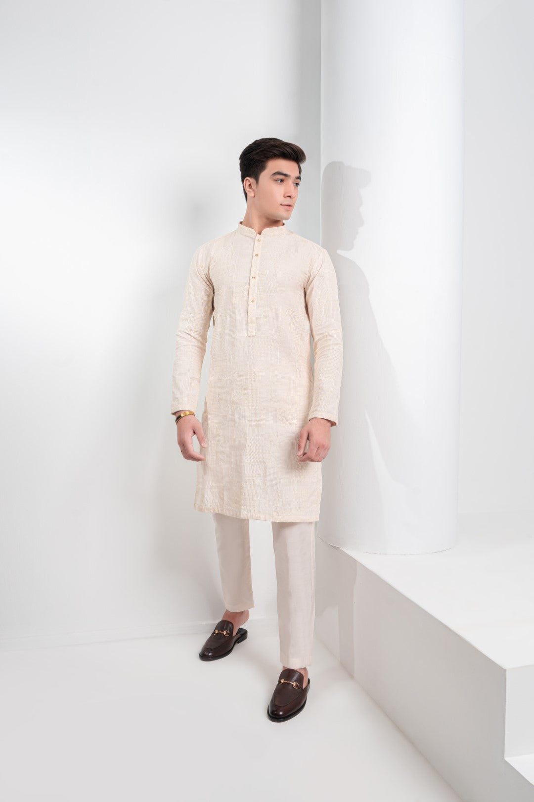 Skin colour  patch work embroidered kurta and trouser.