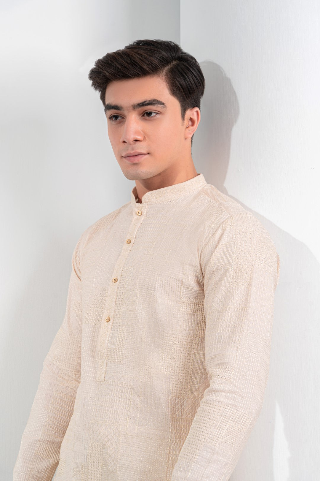 Skin colour  patch work embroidered kurta and trouser.